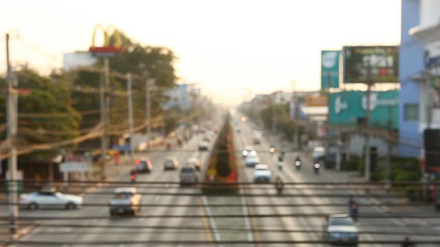 Blurred  traffic  at  noon  in downtown  Chiangmai  Thailand.
