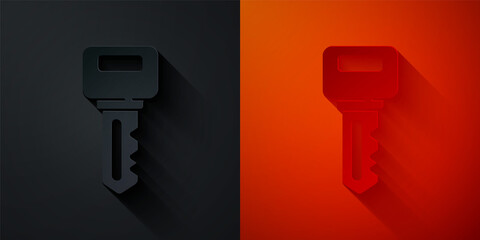 Paper cut House key icon isolated on black and red background. Paper art style. Vector.