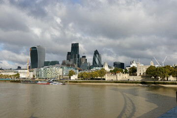 Skyline of London, Great Britain, with thames in the foreground.