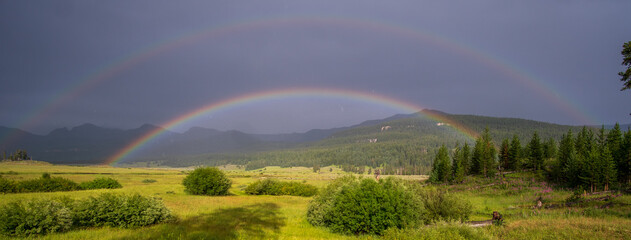 rainbow over field