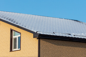 Snow on the roof of the house