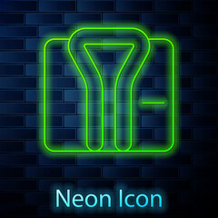 Glowing neon line Bathrobe icon isolated on brick wall background. Vector.