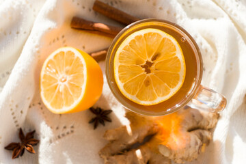 Autumn hot tea with lemon and spices
