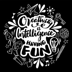 Creativity is intelligence having fun Quote typography.