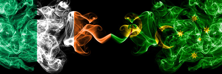 Republic of Ireland, Irish vs Australia, Australian, Cocos Islands smoky mystic flags placed side by side. Thick colored silky abstract smoke flags.