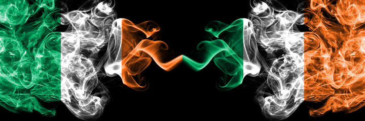 Republic of Ireland, Irish vs Ireland, Irish smoky mystic flags placed side by side. Thick colored silky abstract smoke flags.