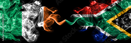 Republic of Ireland, Irish vs South Africa, African smoky mystic flags placed side by side. Thick colored silky abstract smoke flags.