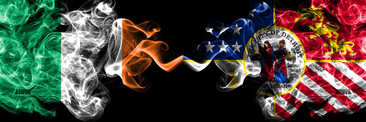 Republic of Ireland, Irish vs United States of America, America, US, USA, American, Detroit, Michigan smoky mystic flags placed side by side. Thick colored silky abstract smoke flags.