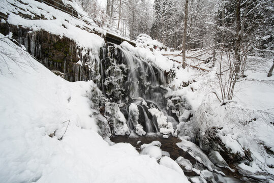waterfall in winter in the snow, located  near fahl in the black forest in germany. (Fahler Wasserfall)