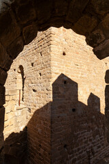 Shadows and arch in the medieval Castle of Loarre, Aragonese castle from the 11th and 12th century, Romanesque architectural style, Huesca province, Aragon, Spain, Europe.