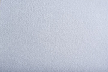Sheet of white paper. Clean white background with smooth paper texture.