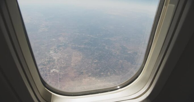 Airplane Window With View Of Landscape