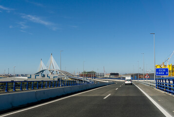 Fototapeta na wymiar traffic on the Puente de la Constitucion de 1812 Bridge in the Bay of Cadiz