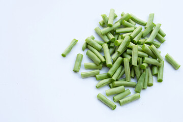 Green beans on white background.