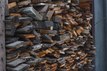 Firewood for melting the stove. Woodpile. Firewood texture. Pile of dry chopped fire wood background