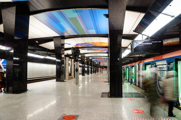 Moscow Metro station train arrival boarding and disembarking of passengers selective focus