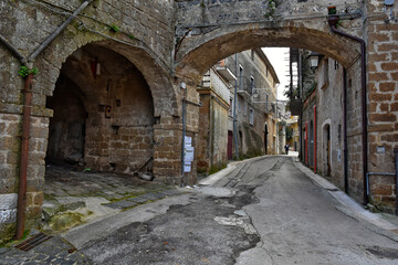 Fototapeta na wymiar A narrow street in Tora e Piccilli, a medieval village in the province of Caserta, Italy.