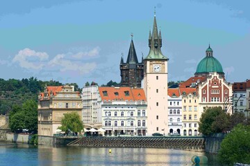 Footbridge of Novotny (Lávka Novotného). It is the Bedrich Smetana Museum, Charles' Spa (Karlovy lázně), and the Club of Technicians. The Vltava River flows under the footbridge.