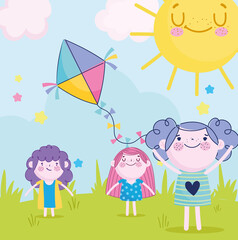 cute girls and boy playing with kite in the park, children