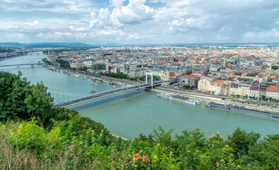 Budapest, Hungary, August 29, 2019: the Danube River bridges and the panorama of Budapest, the capital of Hungary, in the summer. A tourist trip to the ancient metropolitan cities of Europe