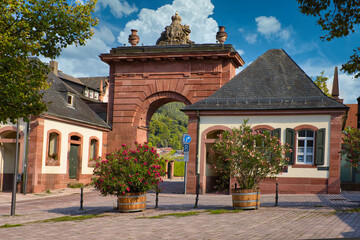 Fototapeta na wymiar Old stone city gate at a town in southern germany with blue sky