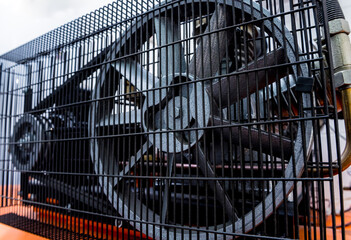 Metal industrial air conditioning vent. HVAC. Ventilation fan background