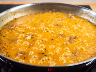 Risotto cooking in pan
