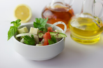 Green salad with onion, parsley, cucumber, tomato and feta cheese