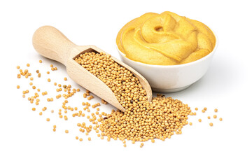 Mustard seeds in the wooden scoop and mustard sauce in the bowl - obrazy, fototapety, plakaty