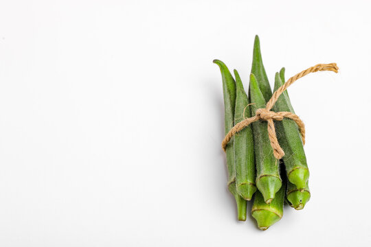 Fresh young okra isolated on white background