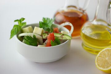 Green salad with onion, parsley, cucumber, tomato and feta cheese