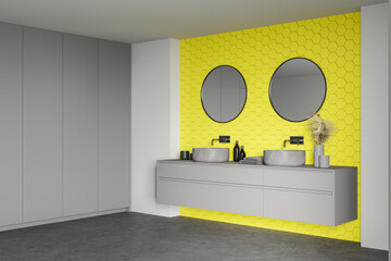 Modern yellow and white bathroom corner with sink