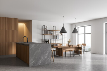 White and wooden kitchen corner with table
