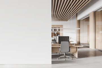 White and wooden open space office interior with mock up wall - obrazy, fototapety, plakaty