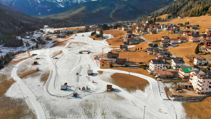Sappada ski trail aerial view in winter season, Italian Alps