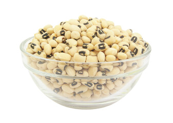 Black eyed beans in wooden bowl isolated on white background