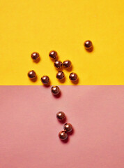 Fototapeta premium Black beads with multicolor background