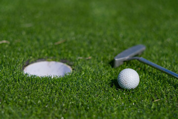Golf balls on artificial grass with blur background
