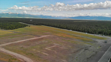 Aerial view of West Yellowstone, town and forest near the National Park