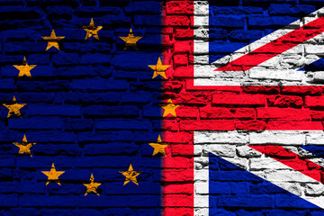 Flag of Europe and United Kingdom on brick wall
