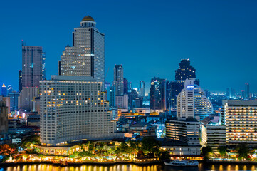 Fototapeta premium Bangkok city skyline in downtown at dusk and night view.