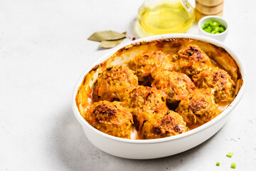 Healtthy vegetarian meatballs in a baking dish. Space for text.