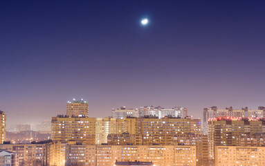city skyline is seen at night