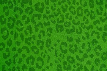 Green texture with dark spots. Green background
