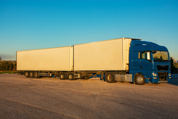 Road train or EMS (european modular system), mega truck with two semi-trailers authorized to transport 60 tons.