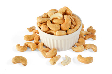 Roasted Cashew nuts in white cup isolated on white background with clipping path