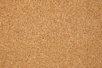 Brown or yellow color of cork board. Textured wooden background. Cork board with copy space. Notice...