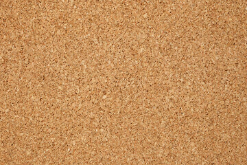Brown or yellow color of cork board. Textured wooden background. Cork board with copy space. Notice board or bulletin board image.