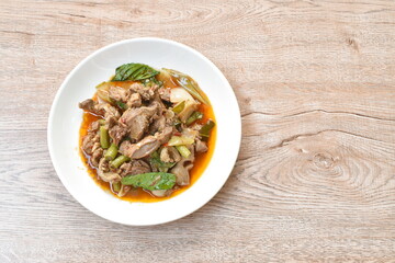 spicy stir-fried chicken gizzard couple liver with yard long bean and chili on plate
