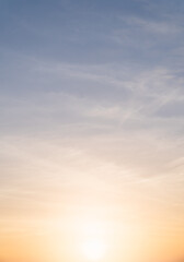 Sunset sky vertical in the morning with orange sunrise on clouds fluffy